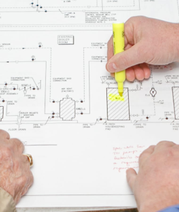 Mechanical drawings being marked up, from Gormley's commercial photography